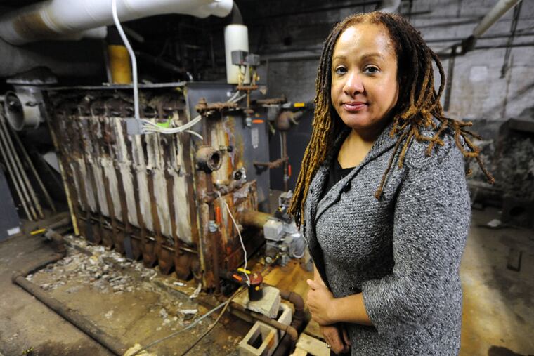 Renata Cobbs-Fletcher, CEO of Northern Children's Services, bundles up with a heavy sweater.