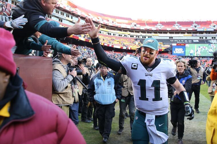 Carson Wentz leaves the field after Eagles 37-27 win over the Redskins.
