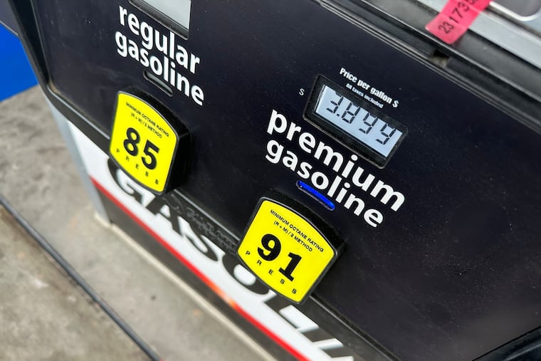 The per-gallon price for premium unleaded fuel is displayed electronically on a pump at a Costco gosoline station Thursday, March 12, 2026, in east Denver.