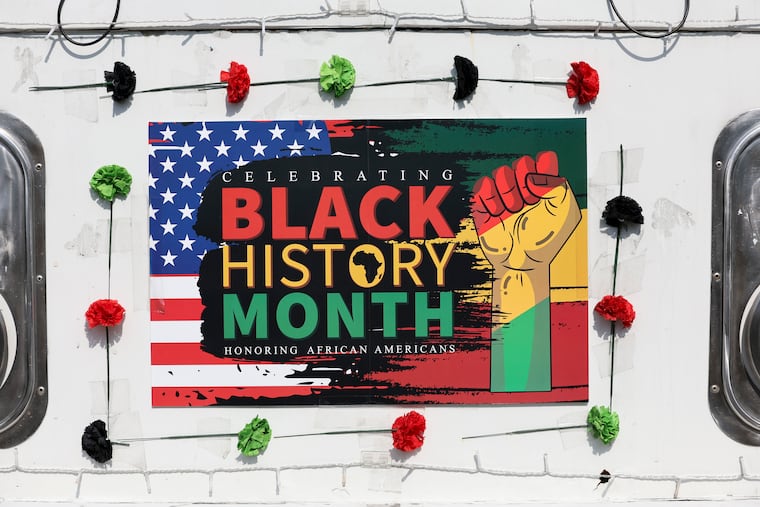 A Black History Month sign adorns a SEPTA trolley at the Elmwood Depot in February 2024.