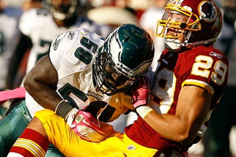 The Eagles defense held the Redskins to 42 rushing yards on Sunday. (Yong Kim/Staff Photographer)