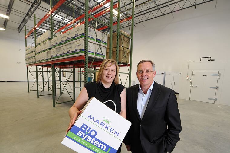 Wes Wheeler, CEO of Marken, and Heather Blagg, branch manager of the company’s new facility in Aston. Marken, which employs about 600 people worldwide, will start with five here and hopes to grow to 15 to 25. CLEM MURRAY / Staff Photographer