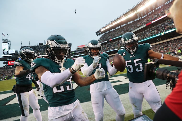 Eagles linebacker Haason Reddick (middle) celebrates with his teammates in the second quarter after he picked up a fumble in the NFC championship game.
