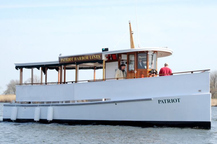 The Patriot, a replica of a 1920s boat, will begin tours on the Schuylkill in May. Cruises will include Bartram’s Garden. (Clem Murray / Staff Photographer)