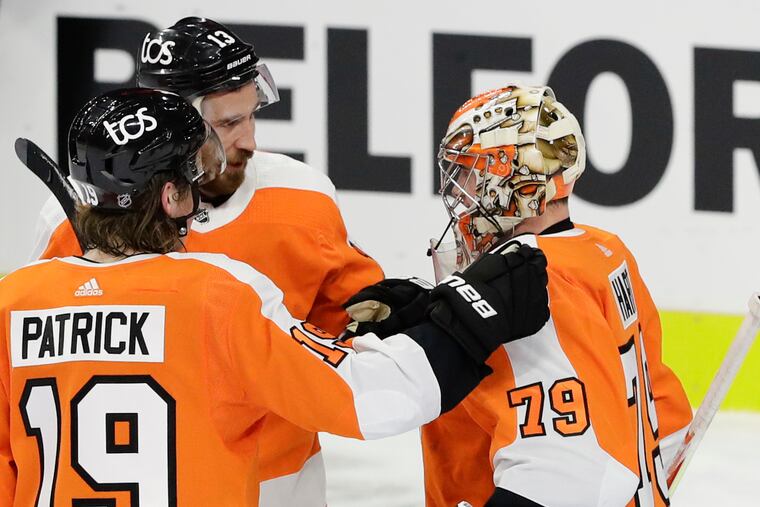 Nolan Patrick, in his first game in nearly two years, and Kevin Hayes (center) scored goals to help make a winner of goalie Carter Hart.