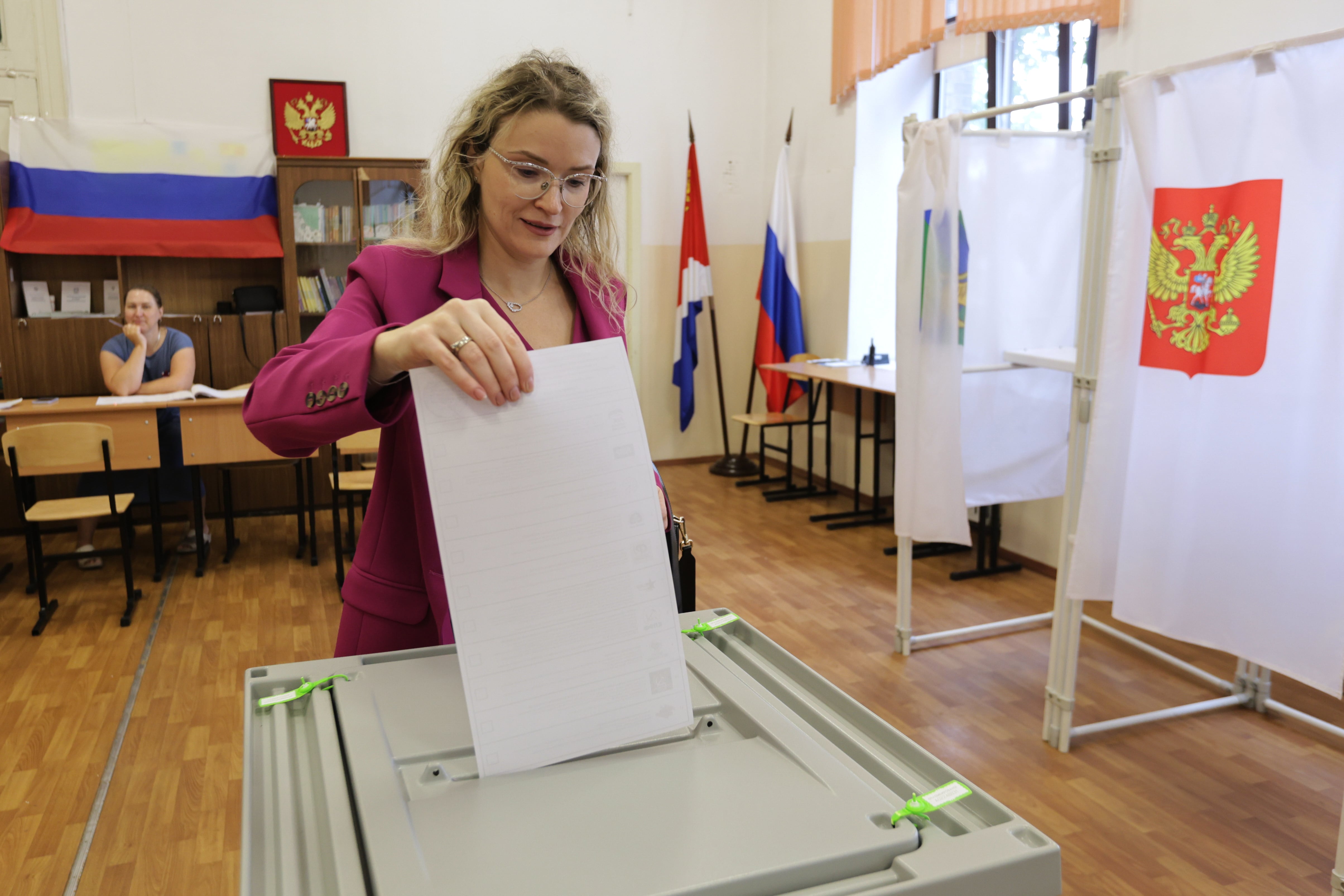 Russians begin 3 days of voting in a parliamentary election set to cement the Kremlin's power