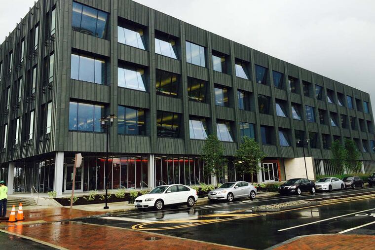 Franklin Square Capital headquarters at the Navy Yard, designed by Digsau, features hand-turned zinc panels and Silicon Valley-style amenities -- a fancy cafeteria and outdoor exercise area.