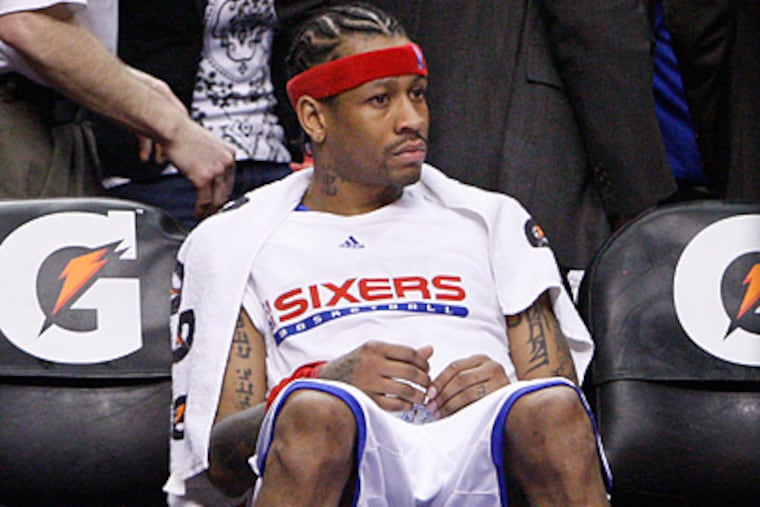 After the players left the center Allen Iverson took a few seconds before leaving the court. ( Ron Cortes / Staff Photographer )