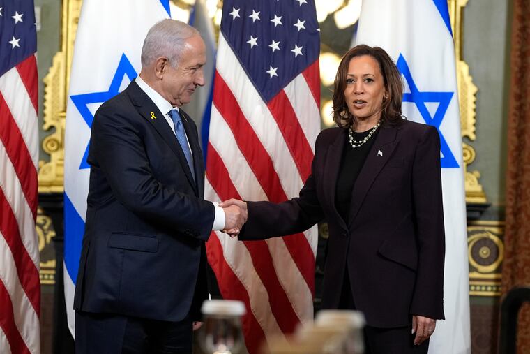 Vice President Kamala Harris, right, shakes hands with Israeli Prime Minister Benjamin Netanyahu in Washington on July 25, 2024.