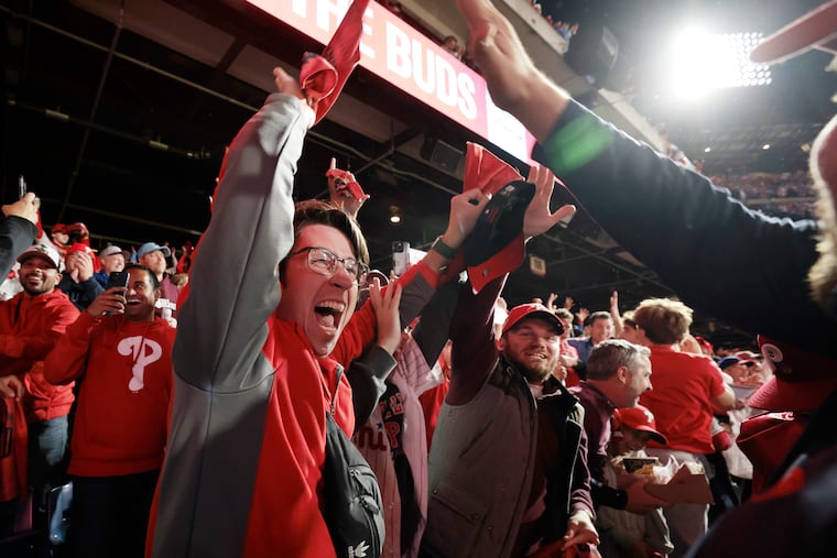 Jason Kantner of Mt. Laurel celebrates a Phillies home run in the first inning in Game 1 of the National League Championship Series at Citizens Bank Park.
