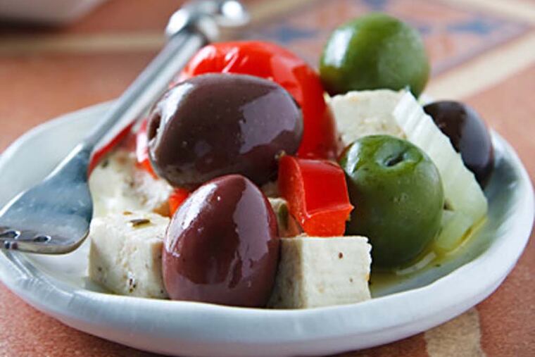 Olive Bar Medley with Tofu "Feta" as featured in Vegan Holiday Kitchen by Nava Atlas. Nava adds that this appetizer is delicious served with fresh whole grain bread and organic (vegan) white wine. (Photo: Susan Voisin)