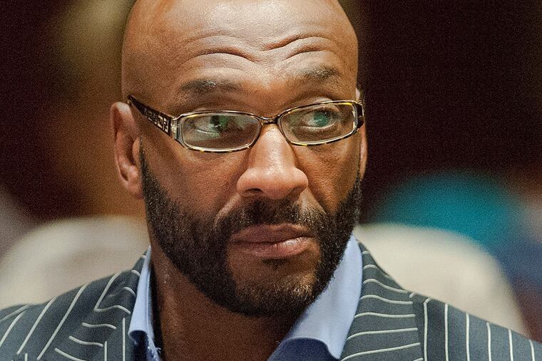 Irving Fryar is charged with conspiracy and theft. CLEM MURRAY / Staff Photographer