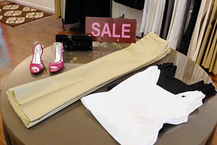 At Skirt, discounted items include Tan Theory slacks and Rafe shoes. (Ron Tarver / Staff Photographer)