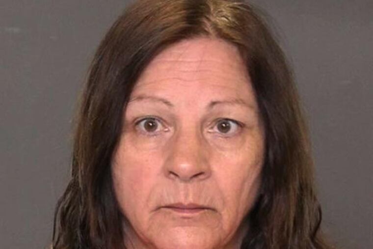 Police photo of Jo Crosby, the mother accused of helping son conceal Mt. Laurel murder.