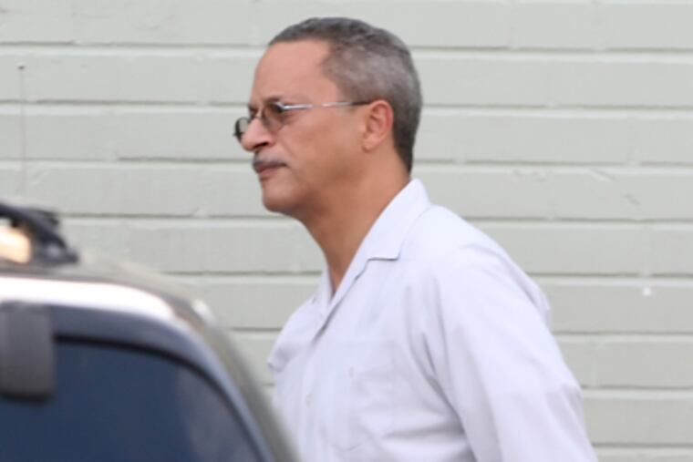 Roberto Santiago, shown last month, was reinstated in June. (Steven M. Falk / Staff Photographer)