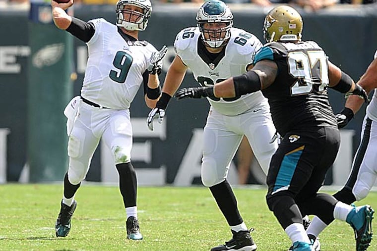 Eagles quarterback Nick Foles and offensive lineman Andrew Gardner. (Clem Murray/Staff Photographer)