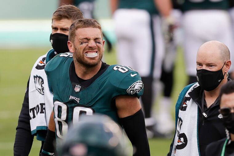 Eagles tight end Zach Ertz grimacing after getting injured against the Ravens on Sunday.