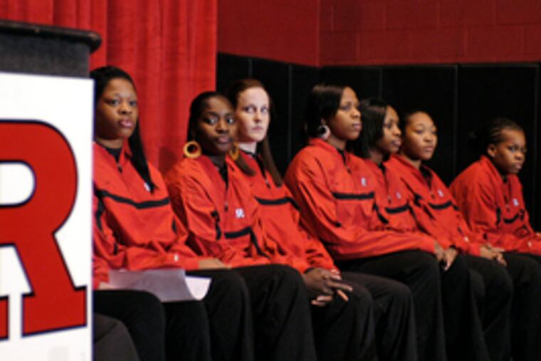 The Rutgers University women's basketball team waits for the start of yesterday's news conference. "We can finally speak up for women. Not just African American women, but all women," said team captain Essence Carson.