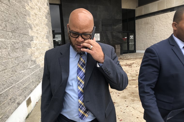 Atlantic City Mayor Frank Gilliam leaving City Hall on Tuesday, Nov. 13, 2018, two days after being involved in a fight outside a casino nightclub. His bruised left eye is visible behind his glasses.
