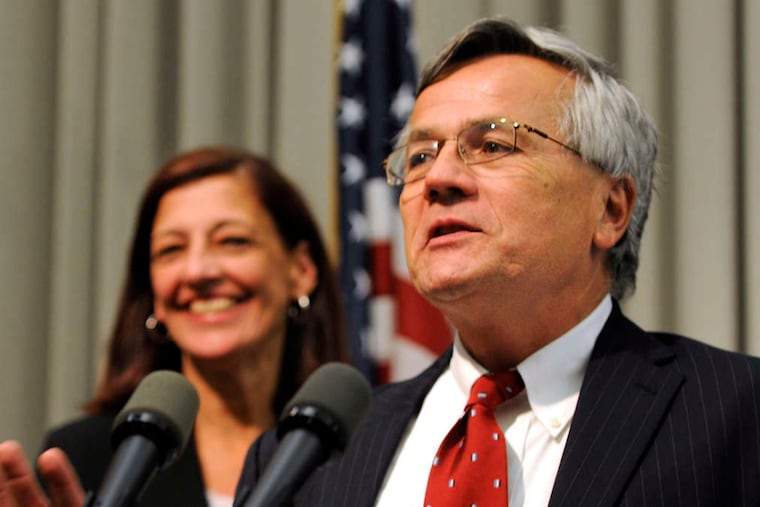 Assistant District Attorney Edward Cameron, shown with Assistant District Attorney Joanne Pescatore, during a news conference at the Philadelphia District Attorney's Office.