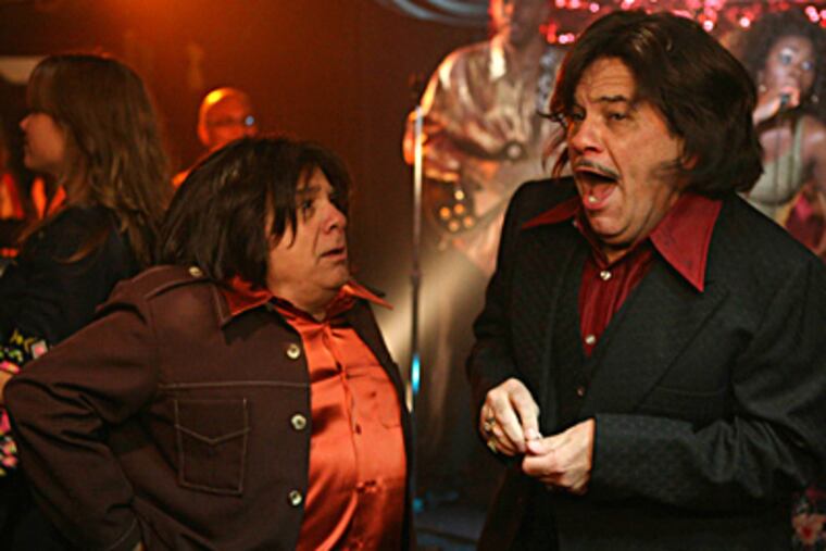 In an episode of "It's Always Sunny in Philadelphia," Danny DeVito (left) sports a Prince Valiant 'do. PATRICK MCELHENNEY / FX