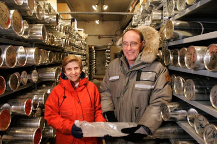 Lonnie Thompson, right and his wife and research partner Ellen Mosley-Thompson stand in the "cold room," where ice cores are stored in the minus-30-degree freezer at Byrd Polar Research Center at Ohio State University Friday, Dec. 21, 2007 in Columbus, Ohio. (AP Photo/Kiichiro Sato)