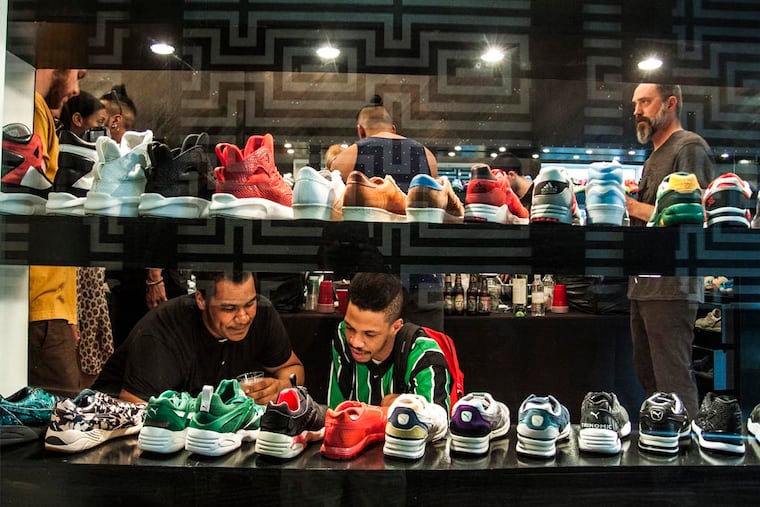 UBIQ and Converse collaborated for an in-store event in 2015. The sneaker boutique, which was converted into an Atmos USA location in November 2020, is closing, leaving a void in Philly's sneaker community. Tim Blackwell / Philly.com