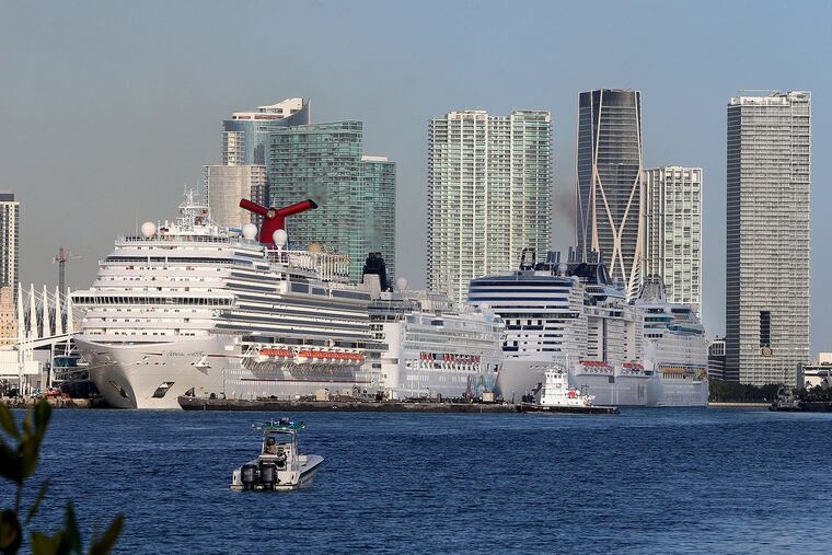 Cruise ships lined up along Port Miami of Miami as cruises have been canceled due to the coronavirus COVID-19 pandemic on March 15, 2020 in Miami, Fla. (Pedro Portal/Miami Herald/TNS)