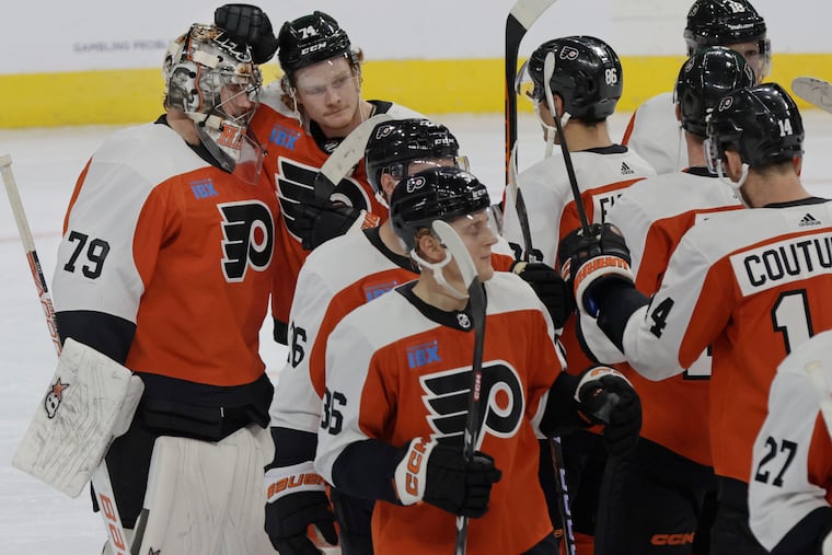 The Flyers may be rebuilding, but don't tell that to a young and hungry group of players led by Carter Hart (back left) and Owen Tippett (back right).