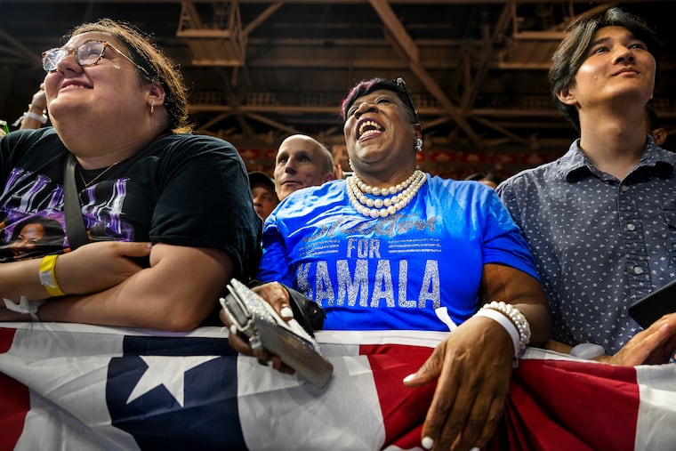 Supporters of Vice President Kamala Harris, the Democratic presidential nominee, and Minnesota Gov. Tim Walz attend a campaign event at Temple University's Liacouras Center in August. The vice president has a commanding lead in the city, according to a recent poll.