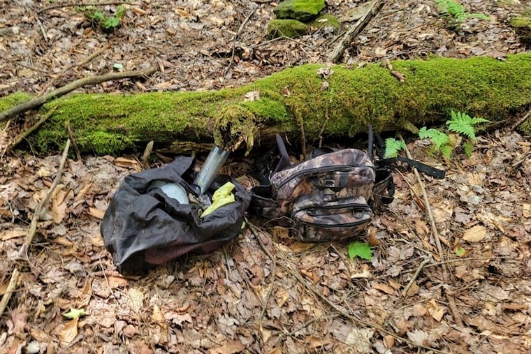 In this image provided by the Pennsylvania State Police, two bags of supplies were found by law enforcement while searching in the woods in northwestern Pennsylvania. Authorities believe the supplies were used by Michael Burham, who escaped from a Pennsylvania prison on July 6.