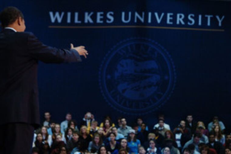 Barack Obama at a town-hall meeting at Wilkes University in Wilkes-Barre yesterday. He said John McCain's open-ended commitment to maintain a U.S. military presence in Iraq showed a lack of judgment.