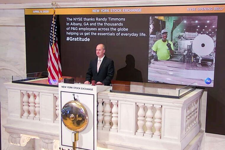 In this photo taken from video provided by the New York Stock Exchange, Chief Security Officer Kevin Fitzgibbons rings the opening bell at the NYSE, on Thursday, April 9, 2020.
