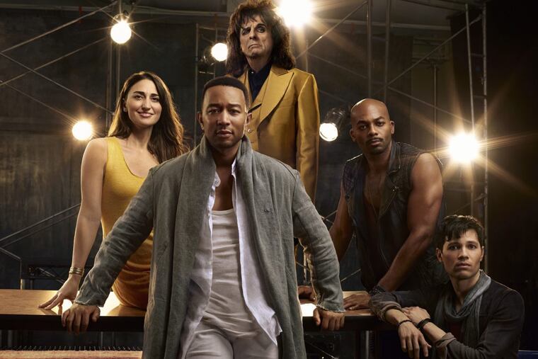 This image released by NBC shows, clockwise from foreground center, John Legend as Jesus, Christ Sara Bareilles as Mary Magdalene, Alice Cooper as King Herod, Brandon Victor Dixon as Judas Iscariot and Jason Tam as Peter from the NBC production, "Jesus Christ Superstar Live In Concert," airing at 8 p.m. April 1