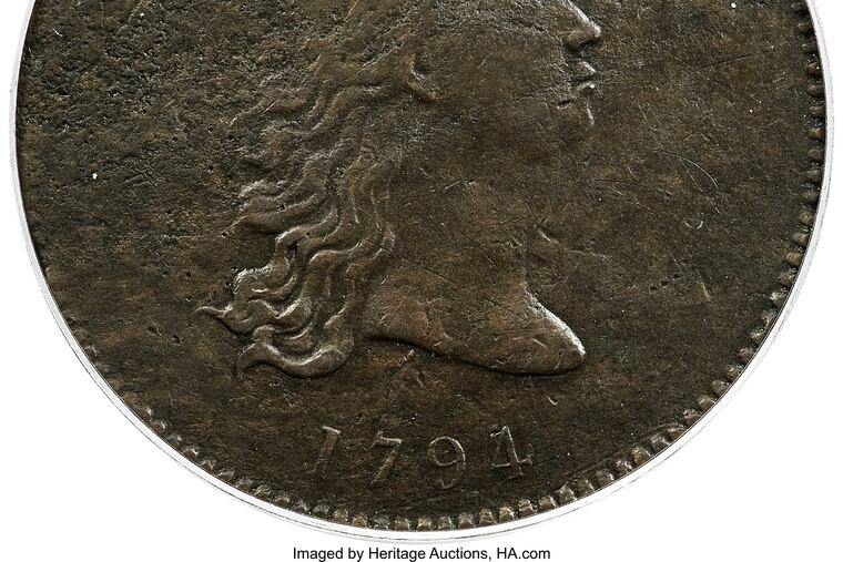 This undated photo provided by Heritage Auctions shows the front of a piece of copper that was struck by the U.S. Mint in Philadelphia in 1794 and was a prototype for the fledgling nation's money. The item, which is known as the “No Stars Flowing Hair Dollar," is owned by businessman and Texas Rangers co-chairman Bob Simpson and will go up for auction at Heritage Auctions in Dallas on Friday, April 23, 2021.