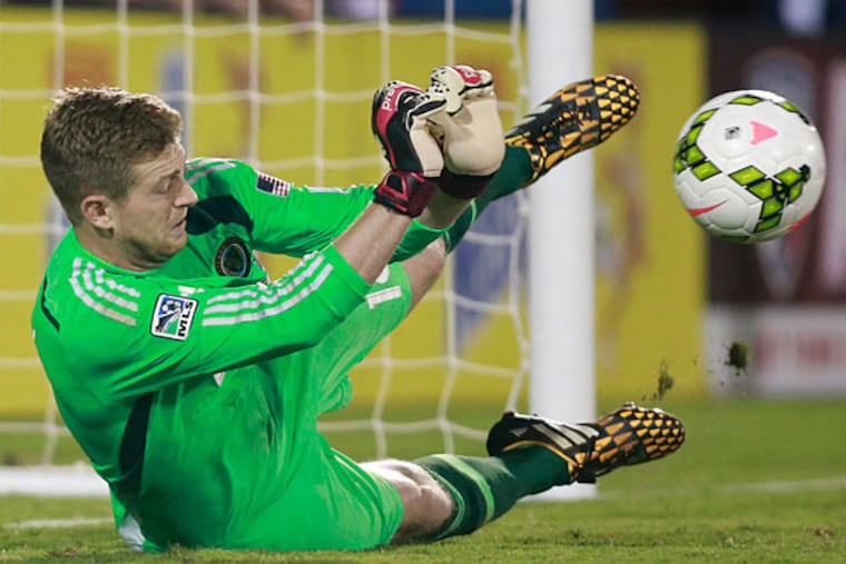 Union goalkeeper Zac MacMath (18) makes a save on FC Dallas forward Blas Perez (not pictured) during penalty kicks during the U.S. Open Cup at Toyota Stadium. Philadelphia defeated FC Dallas 4-3 on penalty kicks. (Tim Heitman/USA Today)