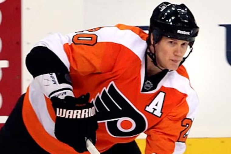 Chris Pronger recorded two assists in his first game back from injury. (Steven M. Falk/Staff Photographer)