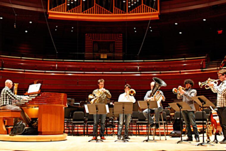 Organist Jeffrey Brillhart, Canadian Brass members (from left) Eric Reed, Achilles Liarmakopoulos, Chuck Daellenbach, Chris Coletti, Brandon Ridenour. (Akira Suwa / Staff Photographer)
