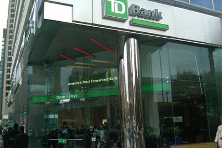 The TD Bank branch at 1500 JFK Boulevard in Center City was busy this evening. Problems resulting from a switch to a new computer system have rankled many customers. (Bob McGovern / Philly.com)