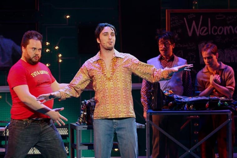 Benny Elledge as Woz, Matt Bradley as Jobs, Raymond J. Lee as Herbert, and Blake Segal as Justin in Philadelphia Theatre Company’s production of Jordan Allen-Dutton and Erik Weiner’s "Nerds," running November 29th through December 29th. (Photo courtesy Paola Nogueras)