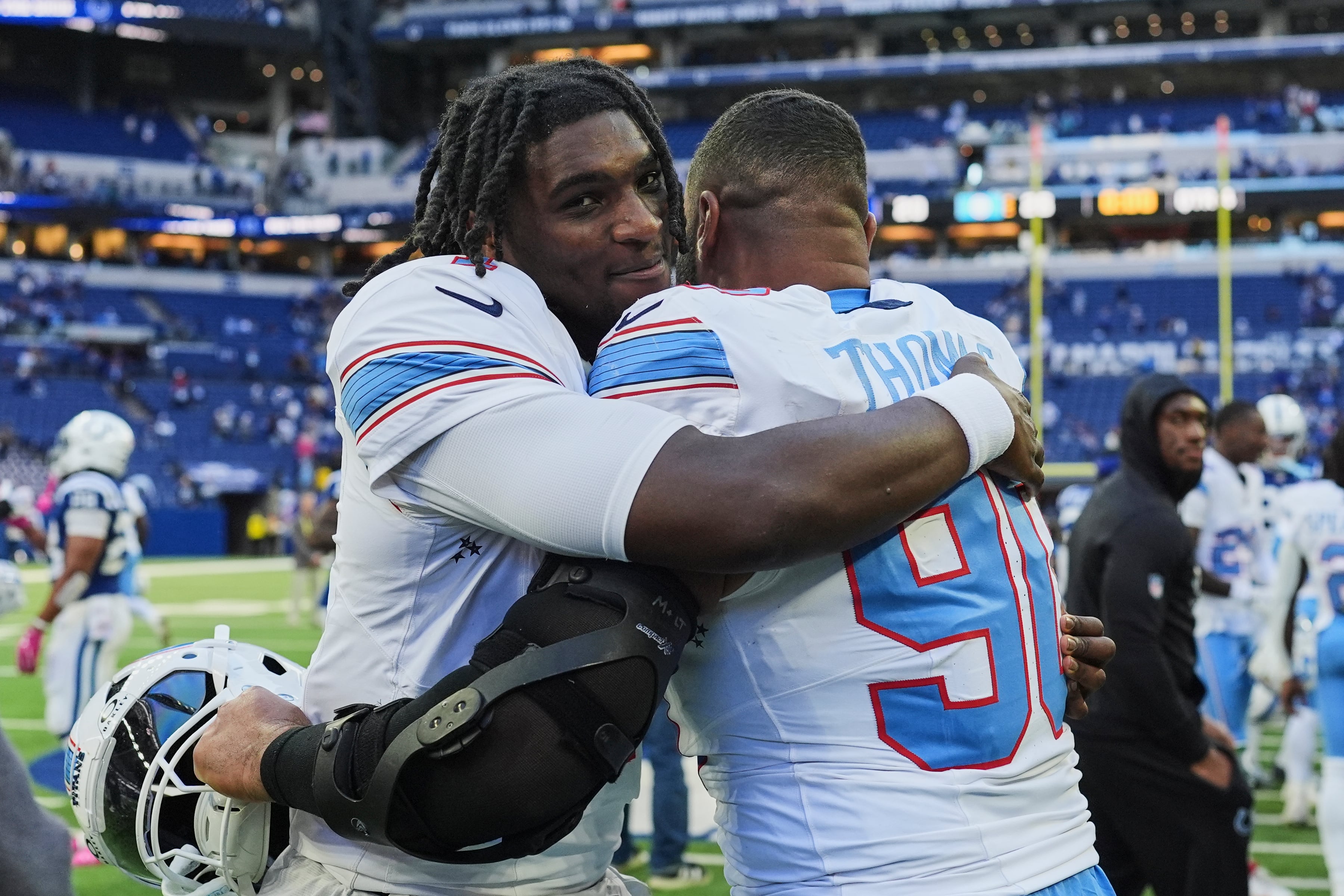 Titans use special teams plays and defense to rally past Colts 26-20 for 1st win of the season