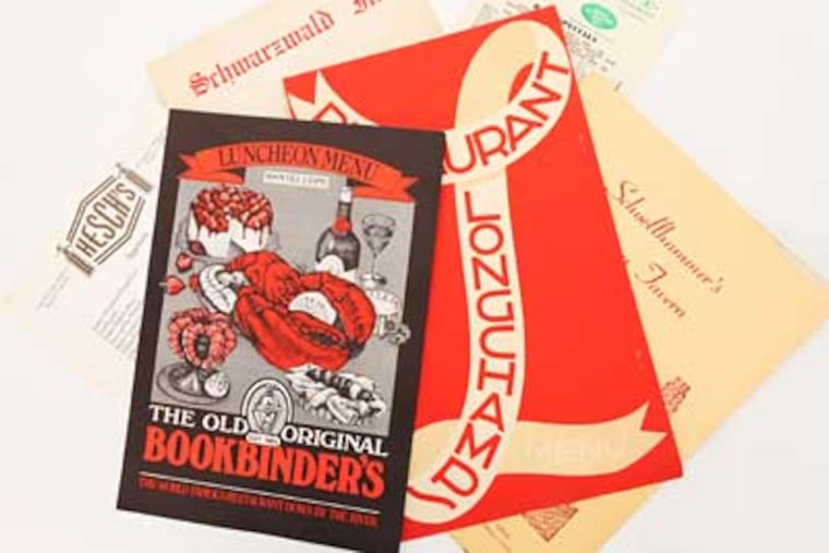 A trove of bills of fare has come his way. (JULIETTE LYNCH / Staff Photographer)