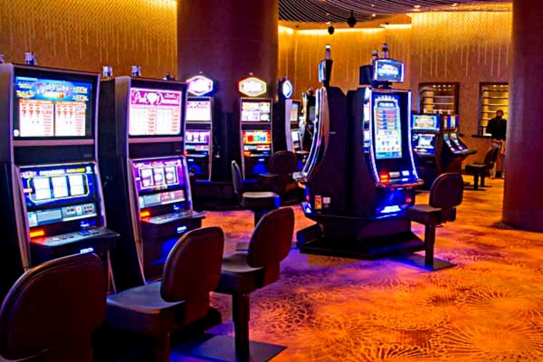 A Revel Casino security guard stands at the entrance to the as-yet-to-open high stakes slot lounge called the Pearl Lounge May 9, 2013. The Pearl Lounge is undergoing last minute touch-ups before it opens Friday, May 10, 2013 at 7:30 pm. It is one of the new features that the Revel Casino is rolling out as it tries to attract gamblers after its recent bankruptcy. ( CLEM MURRAY / Staff Photographer )