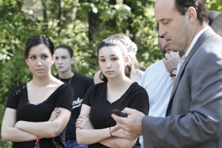 Before a search of the area where Sarah Townsend's car was found, Christa (left) and Lea Russo get instructions from Burlington Twp. Public Safety Director Walter Corter. (Elizabeth Robertson / Staff Photographer)