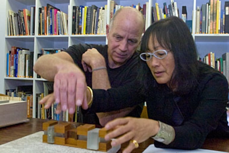 Architects Tod Williams (left) and Billie Tsien show off a model for the new Barnes Foundation on the Parkway in Philadelphia. (Clem Murray / Staff Photographer)