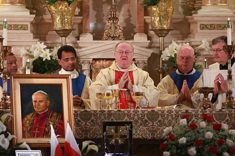 Bishop Dennis Sullivan at St. Joseph's Church, a center of South Jersey's Polish community: "We come to celebrate something of great joy and great importance: that we have two new saints." (David Swanson/Staff)