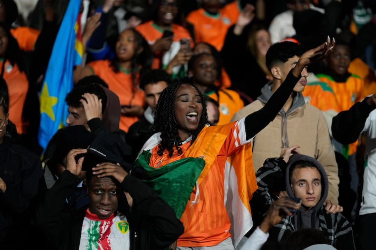 Ivory Coast fans cheer their team during the Africa Cup of Nations group F soccer match between Gabon and Ivory Coast, in Marrakech, Morocco in December.