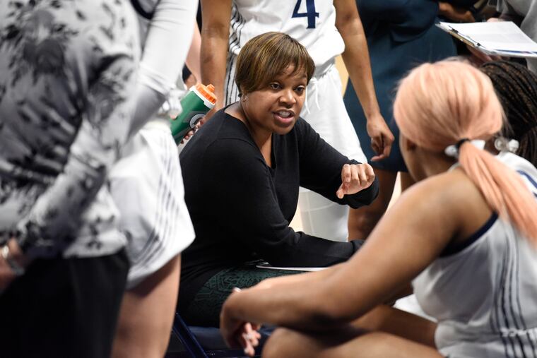 Coquese Washington led Penn State to three straight Big Ten championships from 2011-12 to 2013-14.