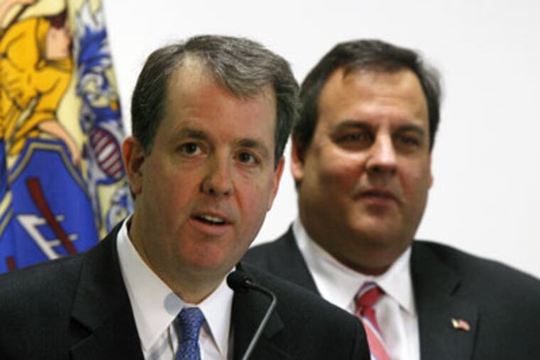 New Jersey Gov. elect Chris Christie, right, listens as Andrew Eristoff, 46, of Manhattan, answers a question Thursday, Jan. 14, 2010, in Newark, N.J., after Christie nominated him as New Jersey's Treasurer. (AP Photo/Mel Evans)