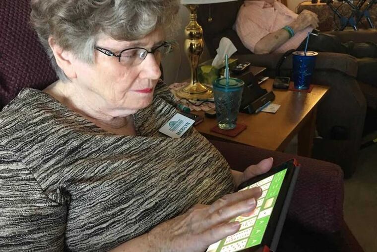 Marilyn Lamm says she especially likes using her GrandPad for instant photos from her family.